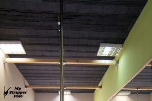 Do dance poles damage the ceiling